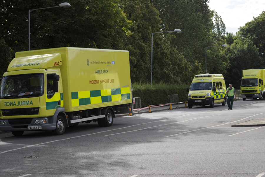 Incident support ambulances attend a scene.